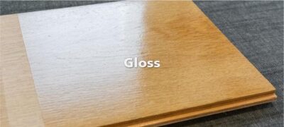 Kayu yang difinishing dengan top coat gloss